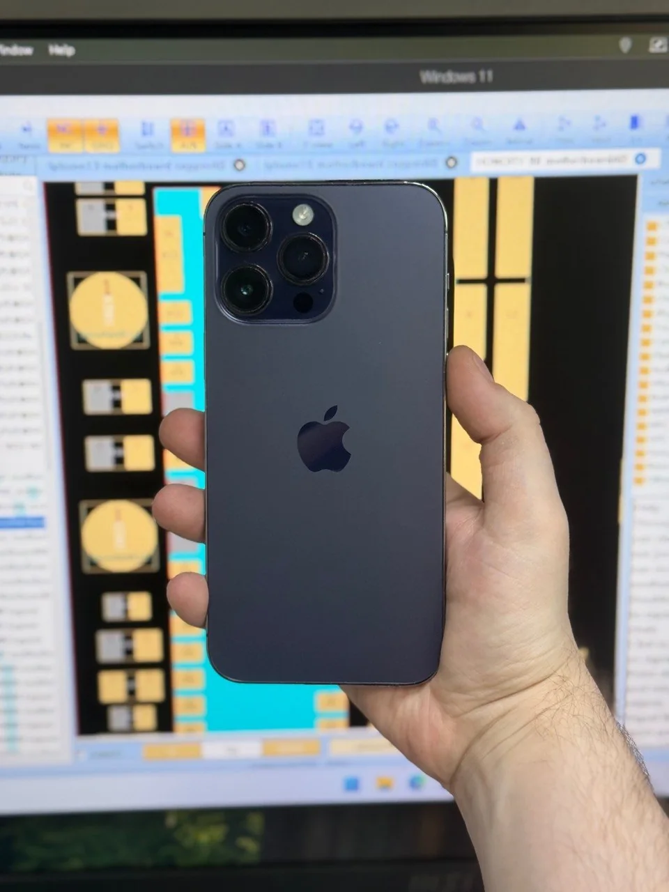 An iPhone after back glass replacement at the TecPro99 repair bench