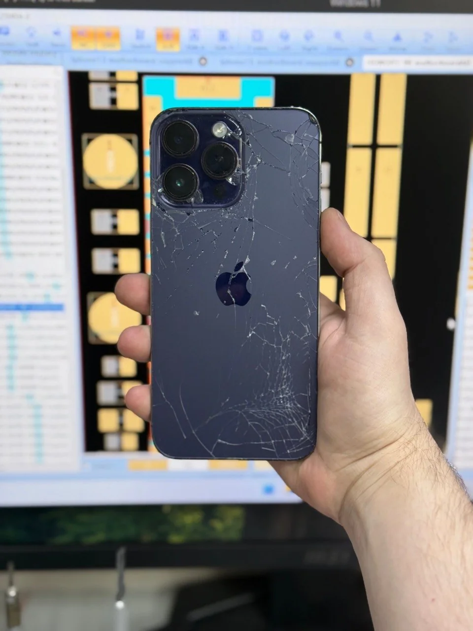 iPhone back glass replacement — Before. The matching blue iPhone before and after back glass replacement.